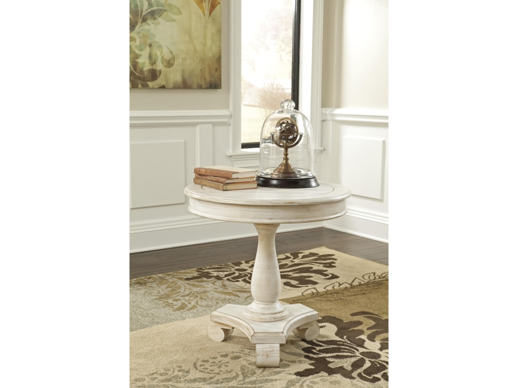 Signature Design By Ashley Mirimyn Round Accent Table With Turned Signature Design By Ashley Mirimyn Round Accent Table With Turned Pedestal Base Olinde S Furniture End Tables