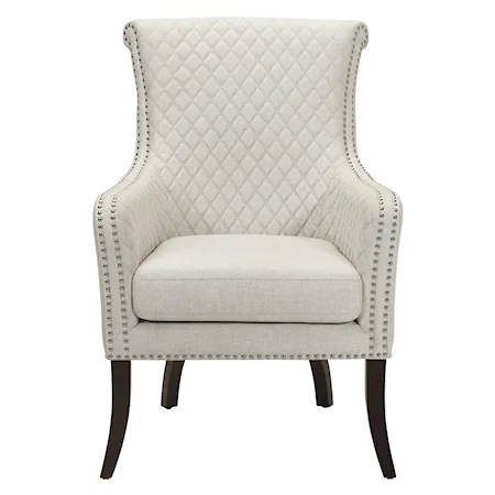 Transitional Quilted Accent Chair with Nailhead Trim and Exposed Wood Legs