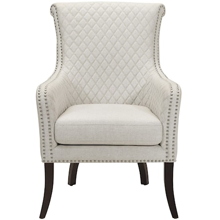 Transitional Quilted Accent Chair with Nailhead Trim and Exposed Wood Legs