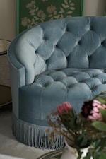 Button tufting adds to the luxurious look of this sofa