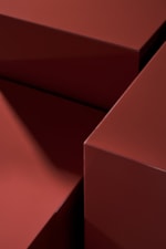 Caracole Caracole Classic Modern 60" x 30" Glossy Rectangular Rouge Cocktail Table with Plinth Base