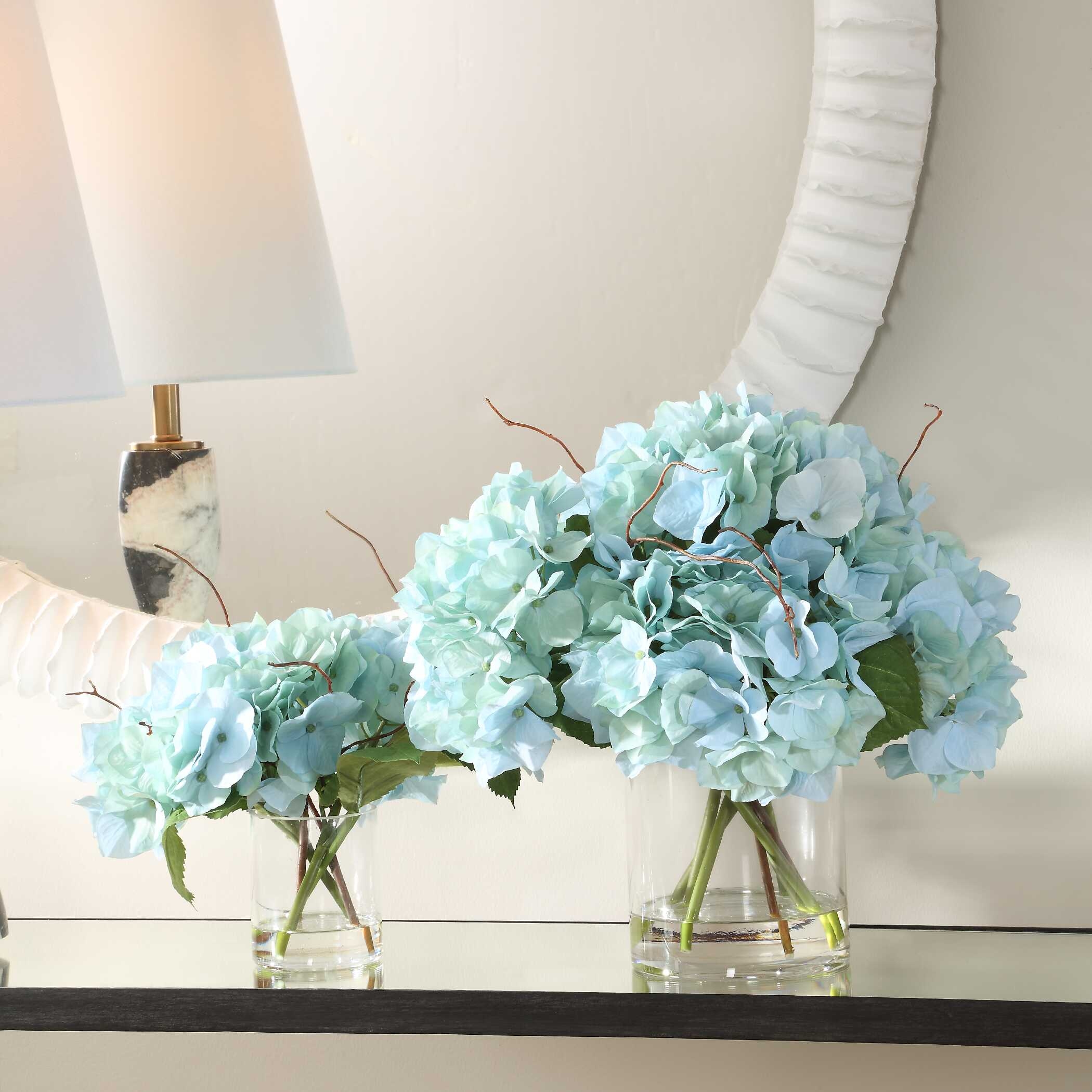 Tranquil Blooms In Glass Vases
