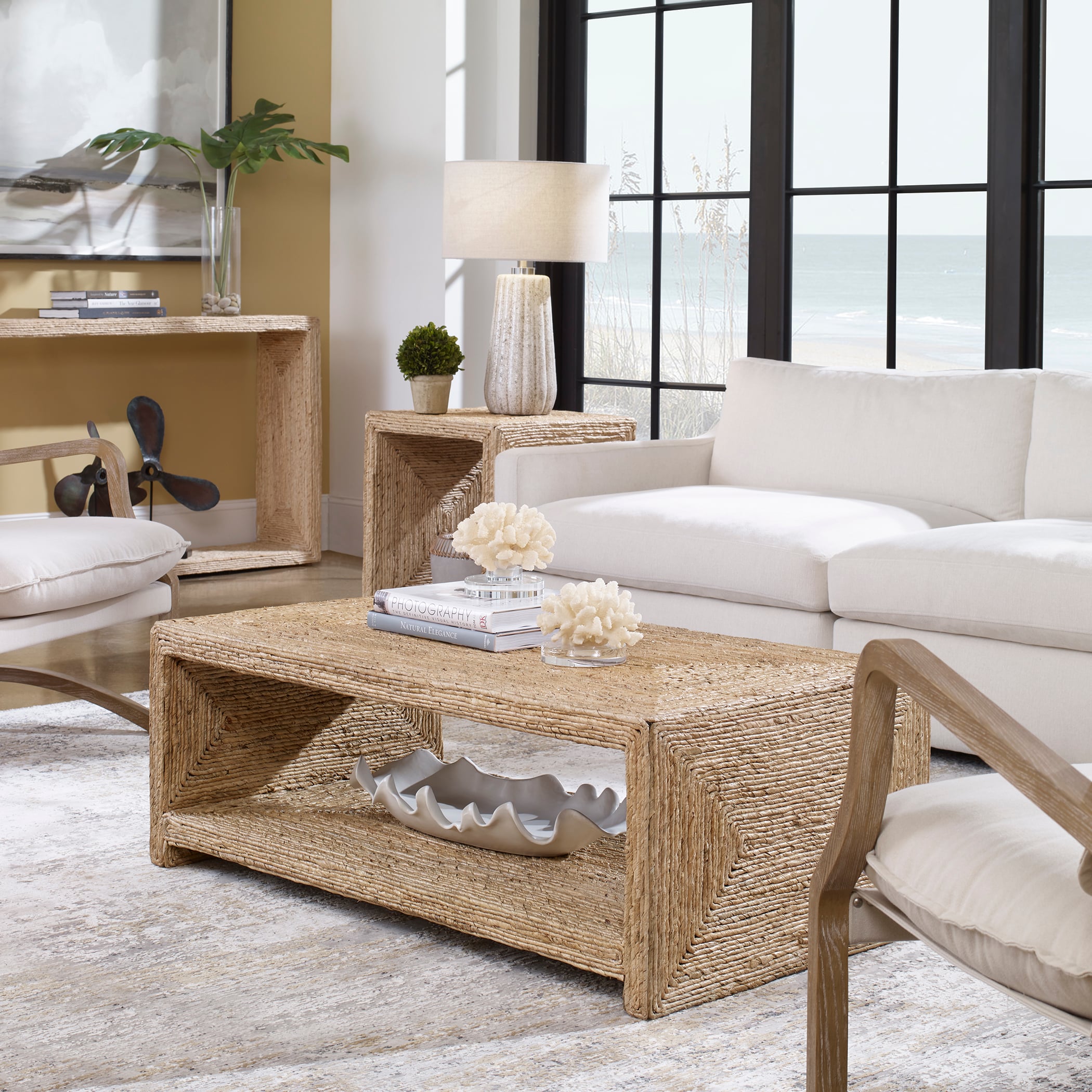 Uttermost lark round wood deals coffee table 25433