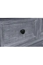 Decorative metal pulls on recessed drawer fronts