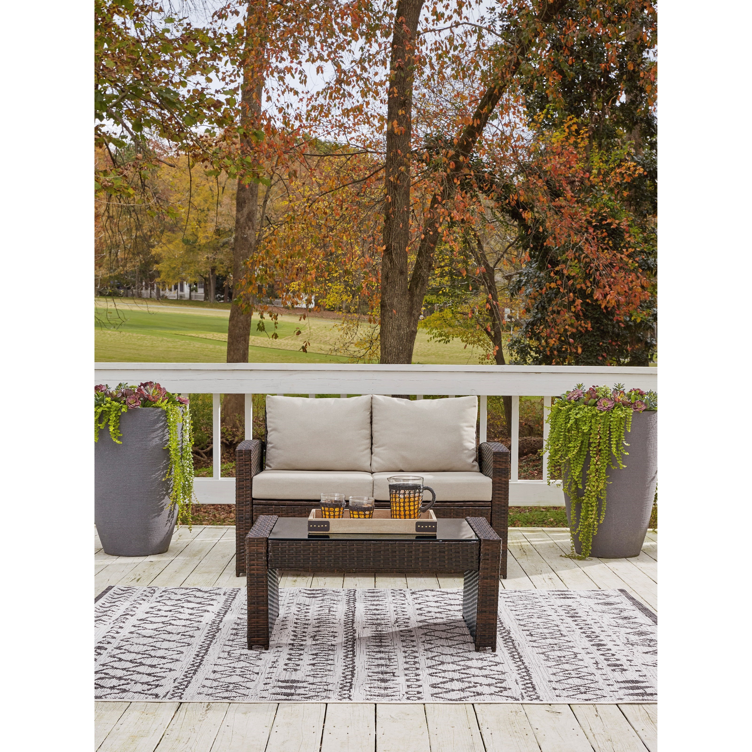 Signature Design by Ashley East Brook Loveseat w/ Table