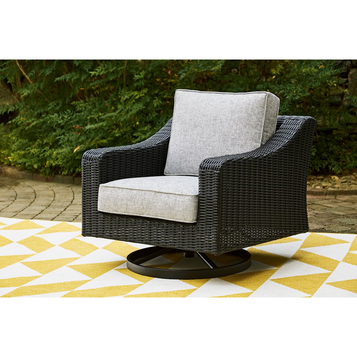 Ashley Furniture Signature Design Beachcroft Outdoor Swivel Lounge With Cushion