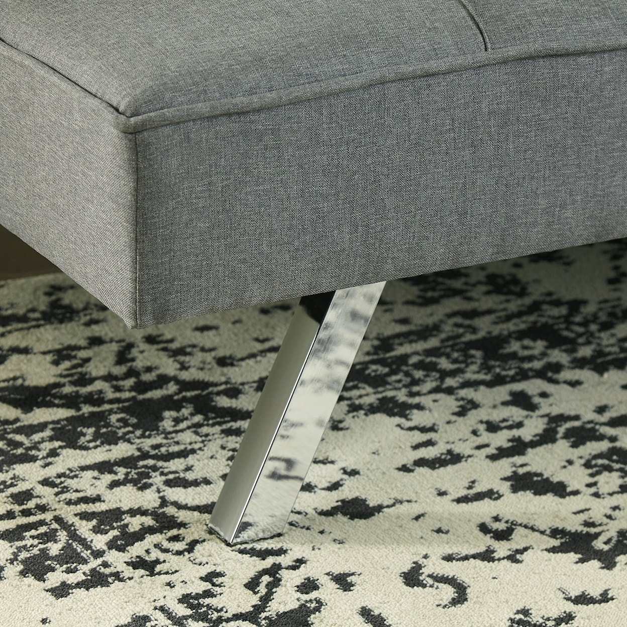 Ashley Furniture Signature Design Santini Flip Flop Armless Sofa