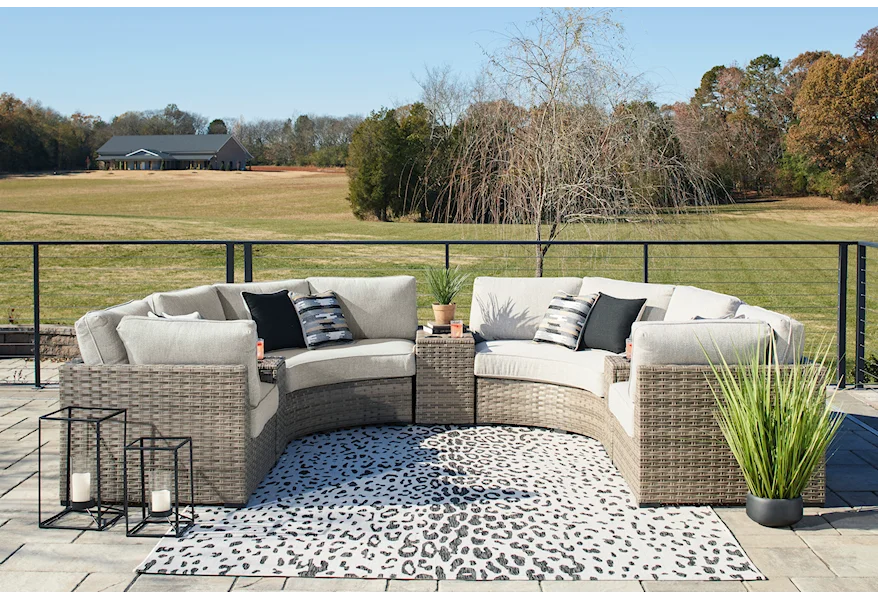 Calworth 7-Piece Outdoor Sectional by Signature Design by Ashley at Westrich Furniture & Appliances