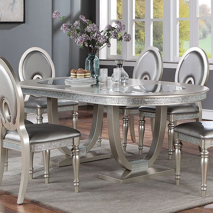 Oval glass table and chairs hot sale