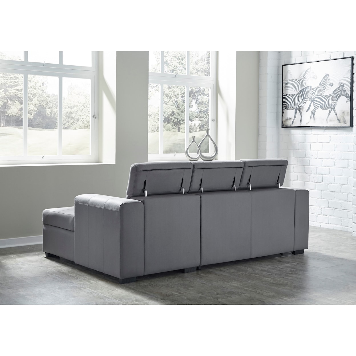 Benchcraft Salado 2-Pc Sectional w/ Sleeper & Storage Chaise