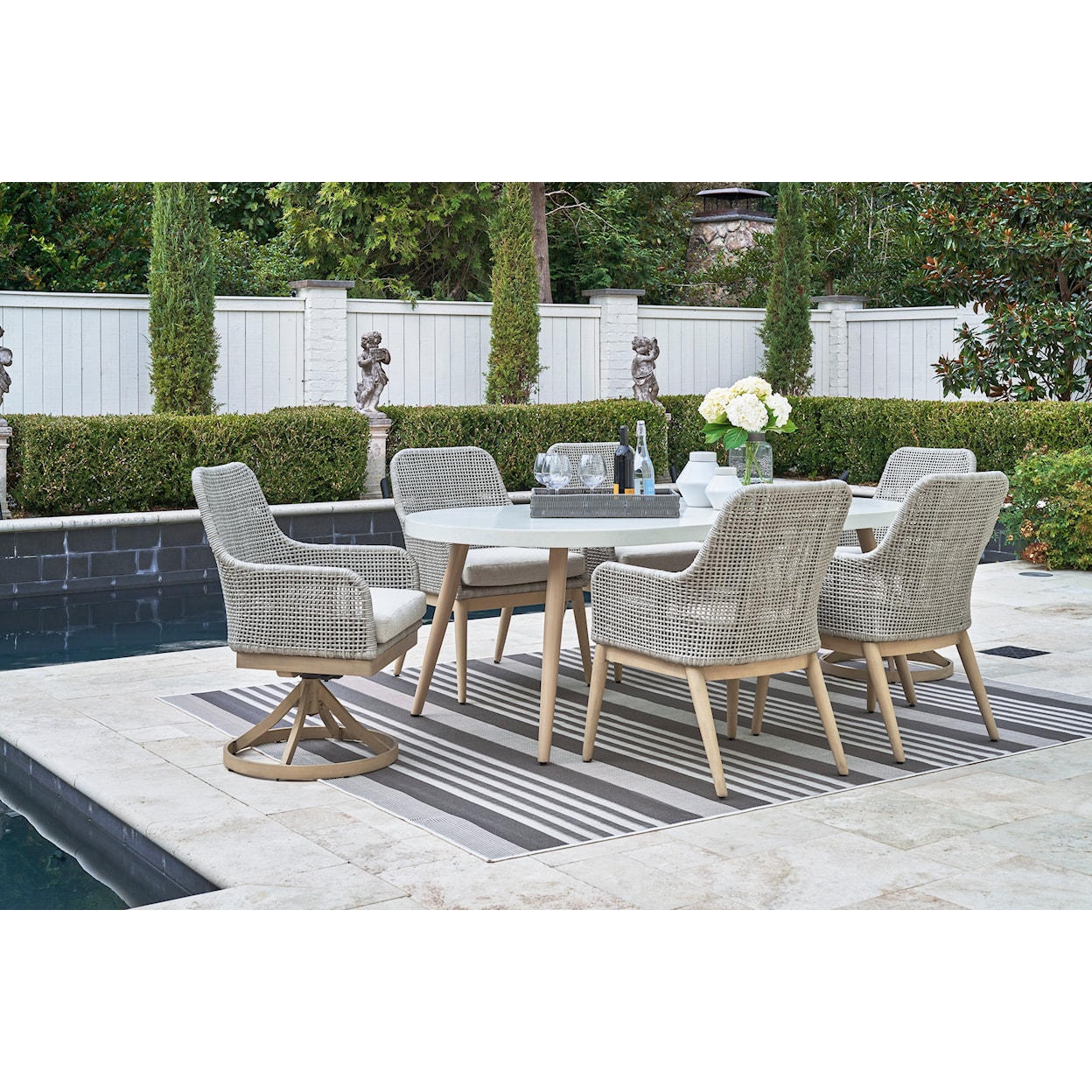 Signature Design by Ashley Seton Creek Outdoor Swivel Dining Chair (Set of 2)