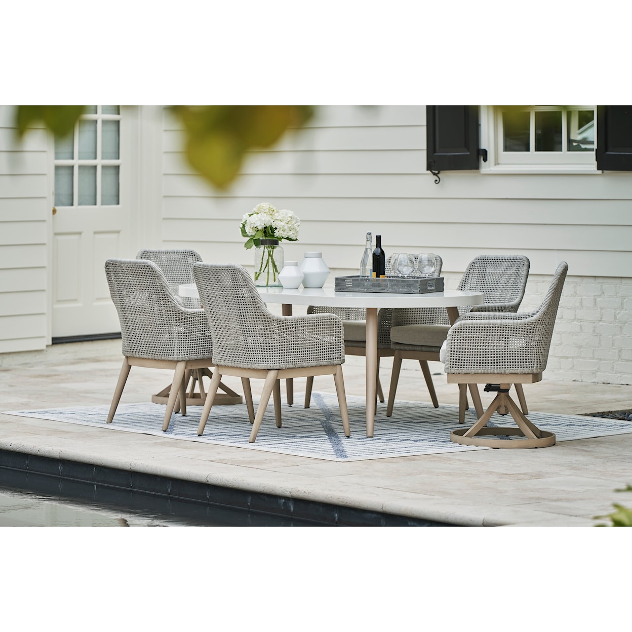 Signature Design by Ashley Seton Creek Outdoor Swivel Dining Chair (Set of 2)