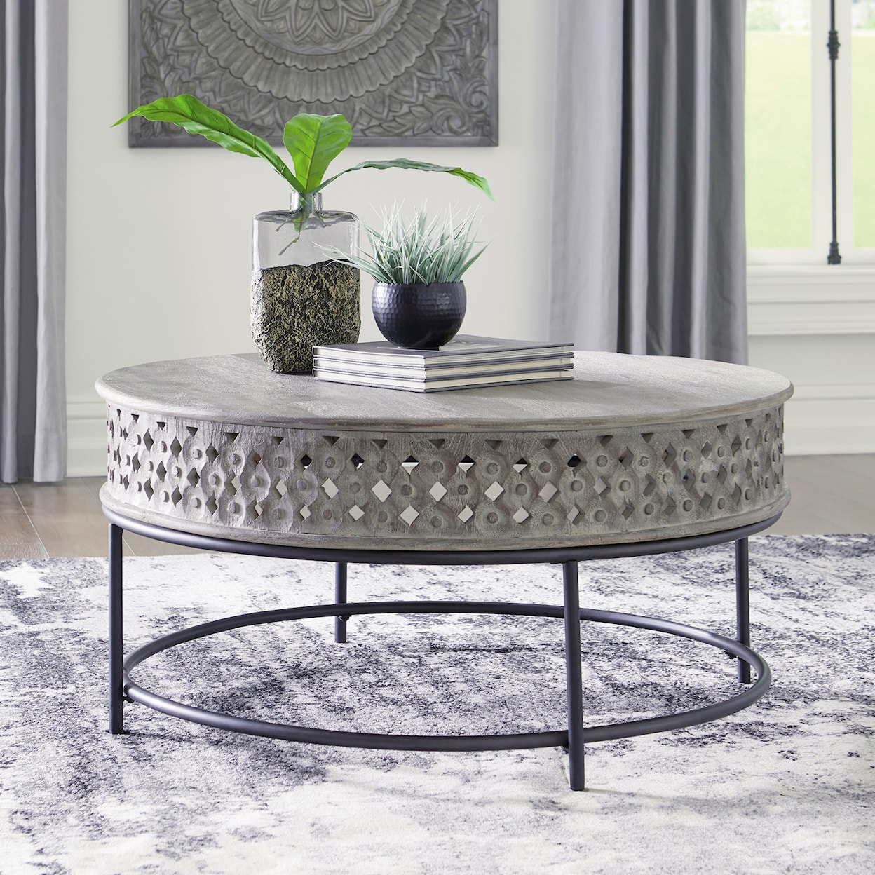 Signature Design by Ashley Rastella Round Cocktail Table