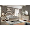 Ashley Signature Design Realyn Queen Upholstered Storage Bed