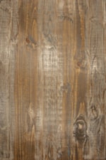 A multi-step, soft, multi-colored finish on hand-distressed wood shows beautiful on the table top