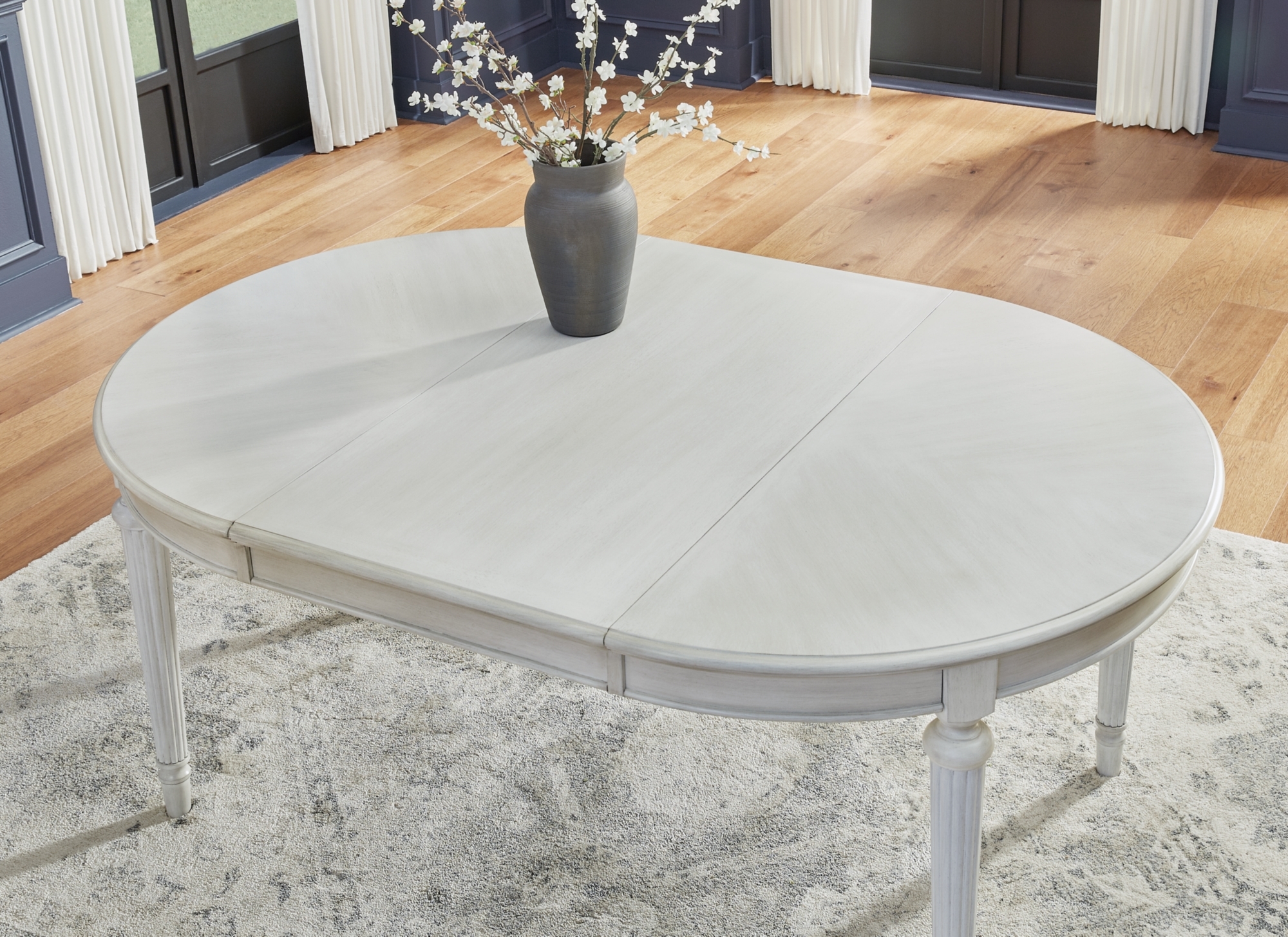 Benchcraft Montelaine Oval Dining Room Ext Table