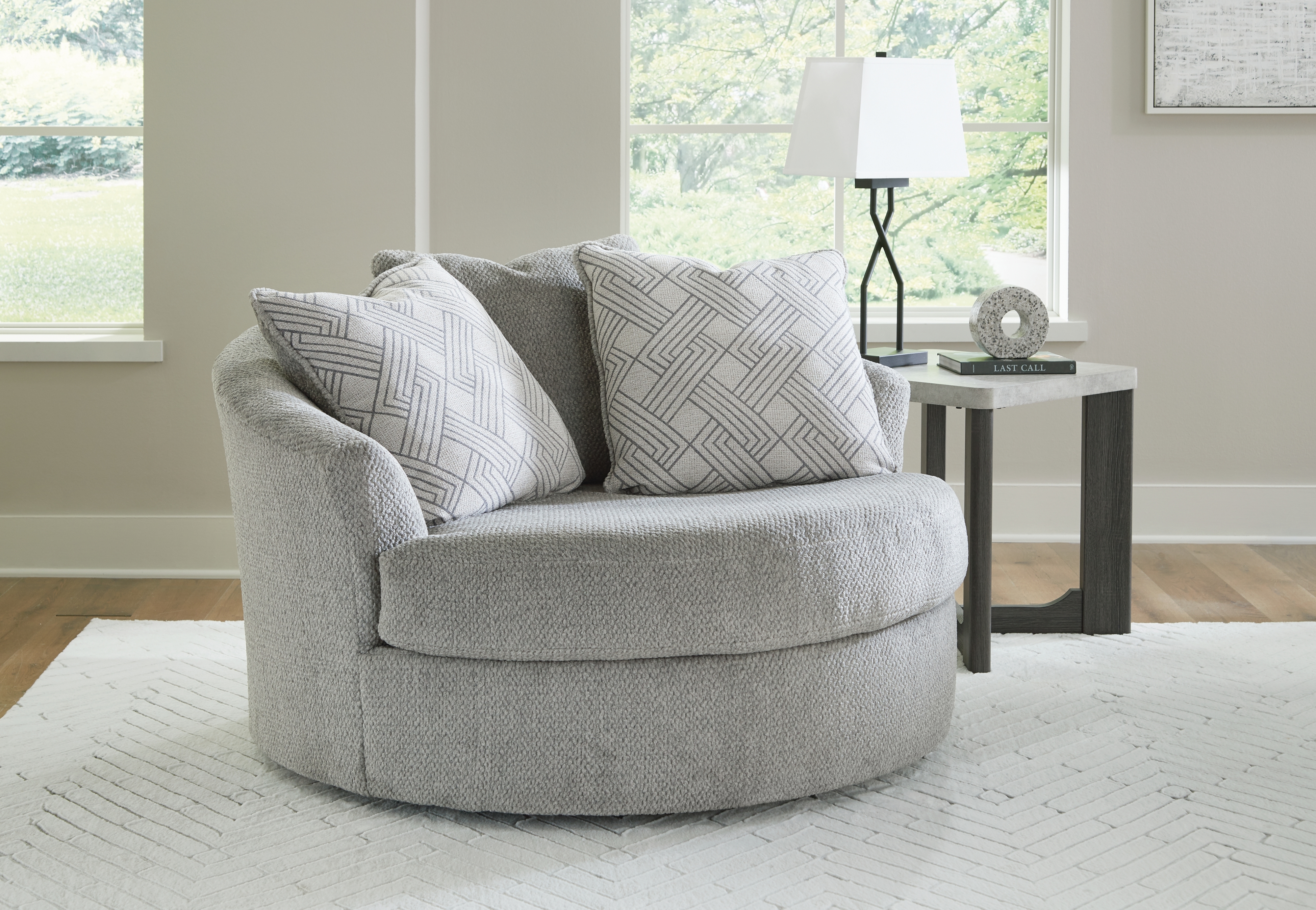 Signature Design by Ashley Casselbury Oversized Swivel Chair And Ottoman