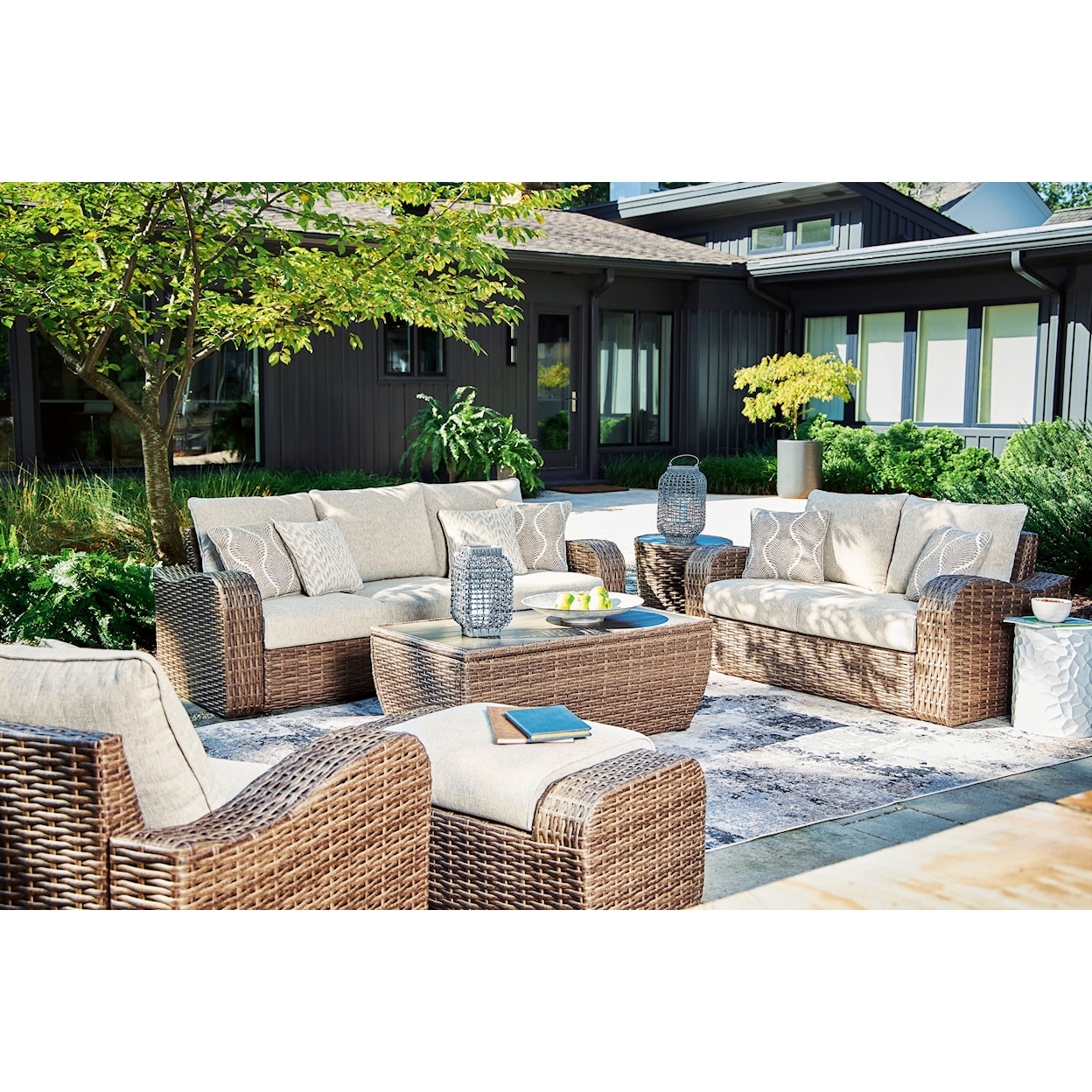 Signature Design by Ashley Sandy Bloom Outdoor Ottoman with Cushion