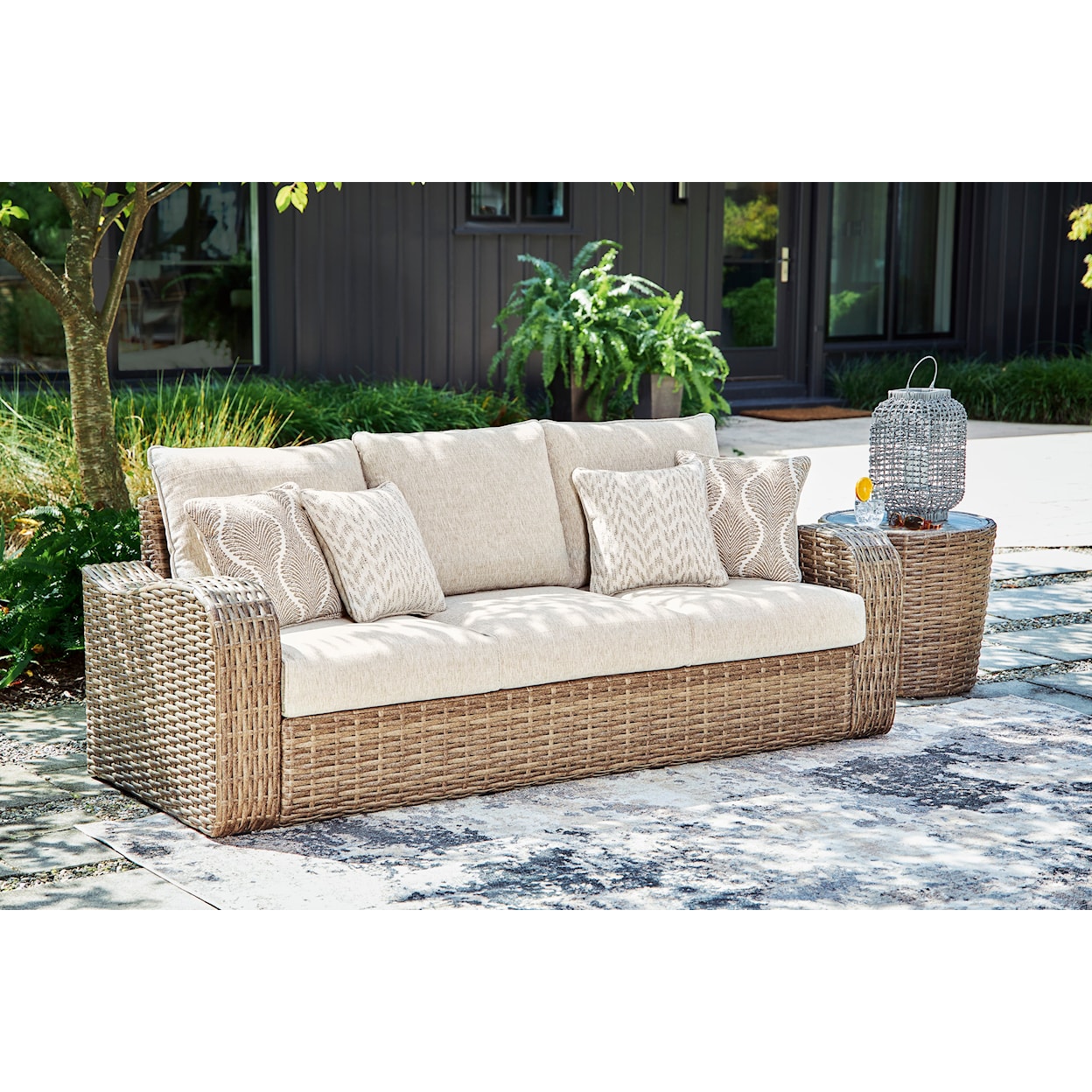 Ashley Furniture Signature Design Sandy Bloom Outdoor Sofa with Cushion