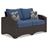 Signature Design Windglow Outdoor Loveseat with Cushion