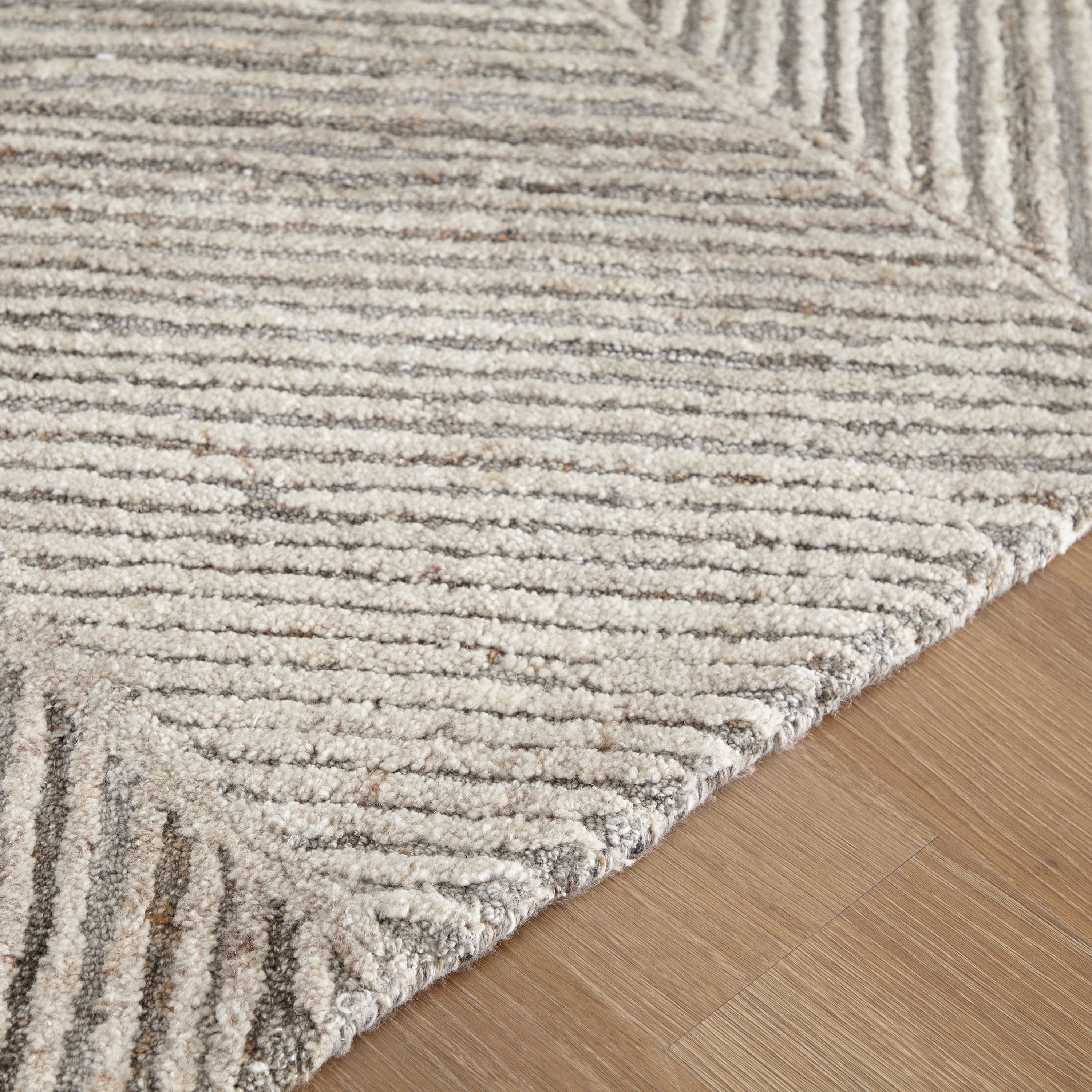 Ashley Signature Design Contemporary Area Rugs R405132 Leaford Taupe/Brown/Gray Medium Rug