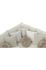 Several pillows with varying textures and designs