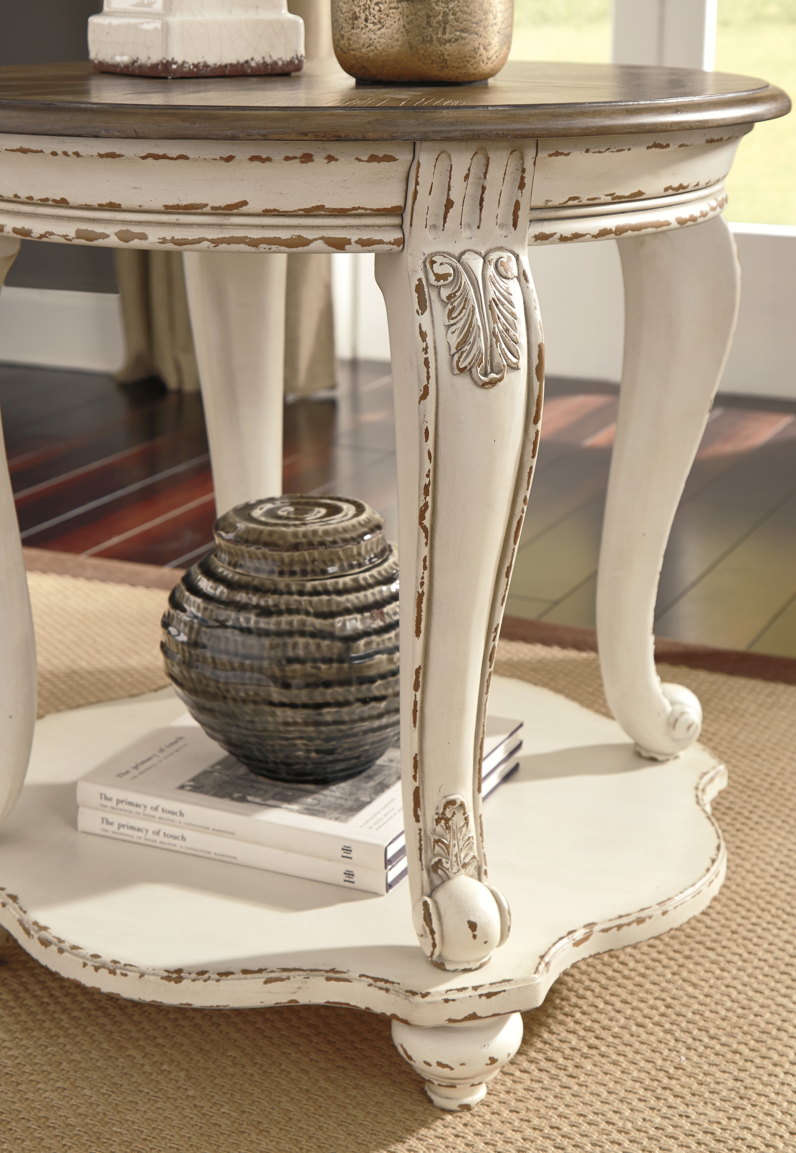 Signature Design by Ashley Realyn Round End Table