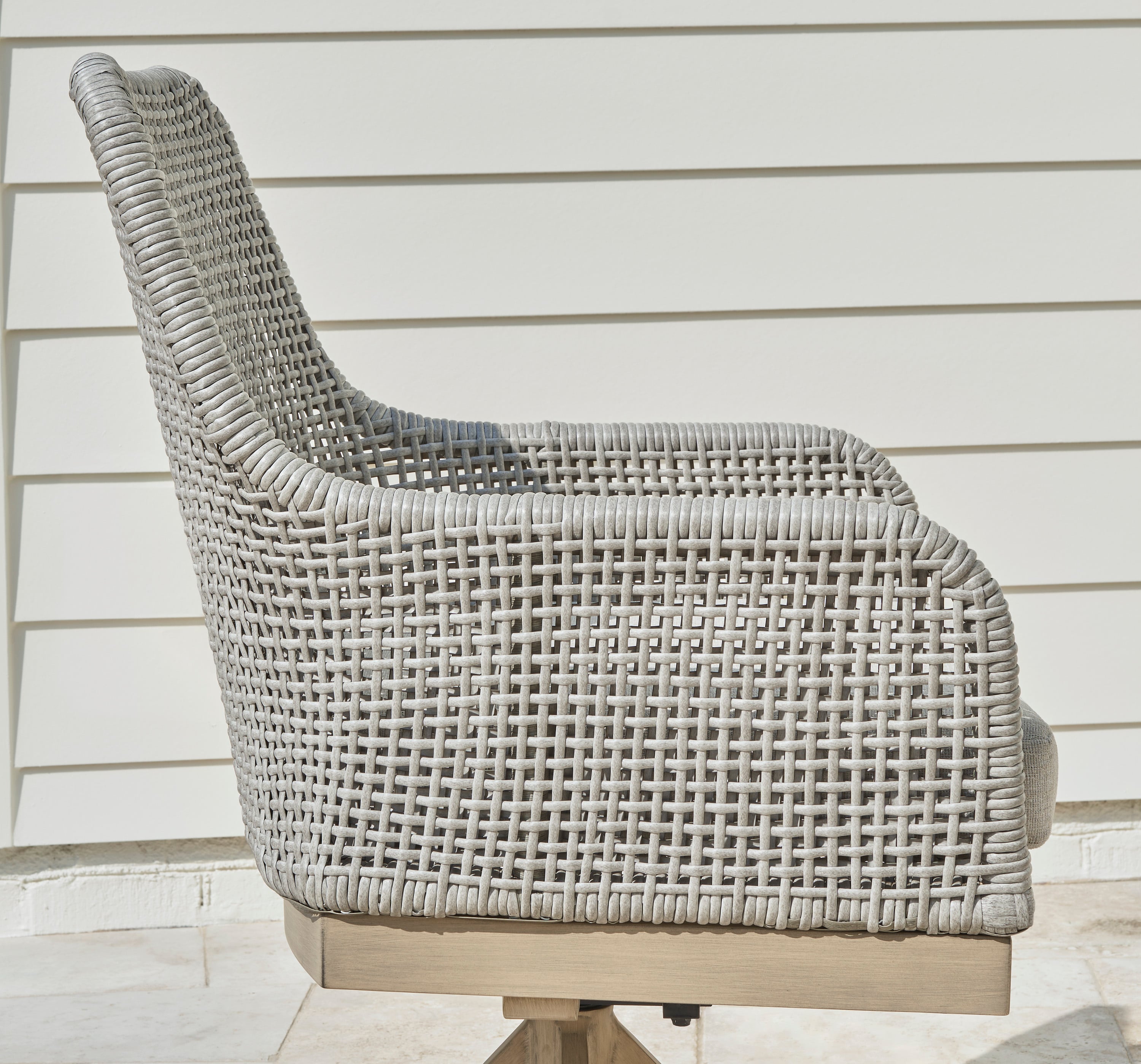 Signature Design by Ashley Seton Creek Outdoor Swivel Dining Chair
