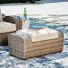 Benchcraft Sandy Bloom Outdoor Ottoman with Cushion