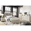 Signature Design Cambeck King Upholstered Bed w/ 4 Drawers