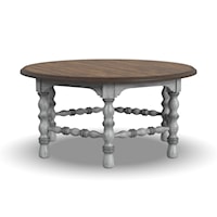 Relaxed Vintage Round Cocktail Table with Spool Turned Legs