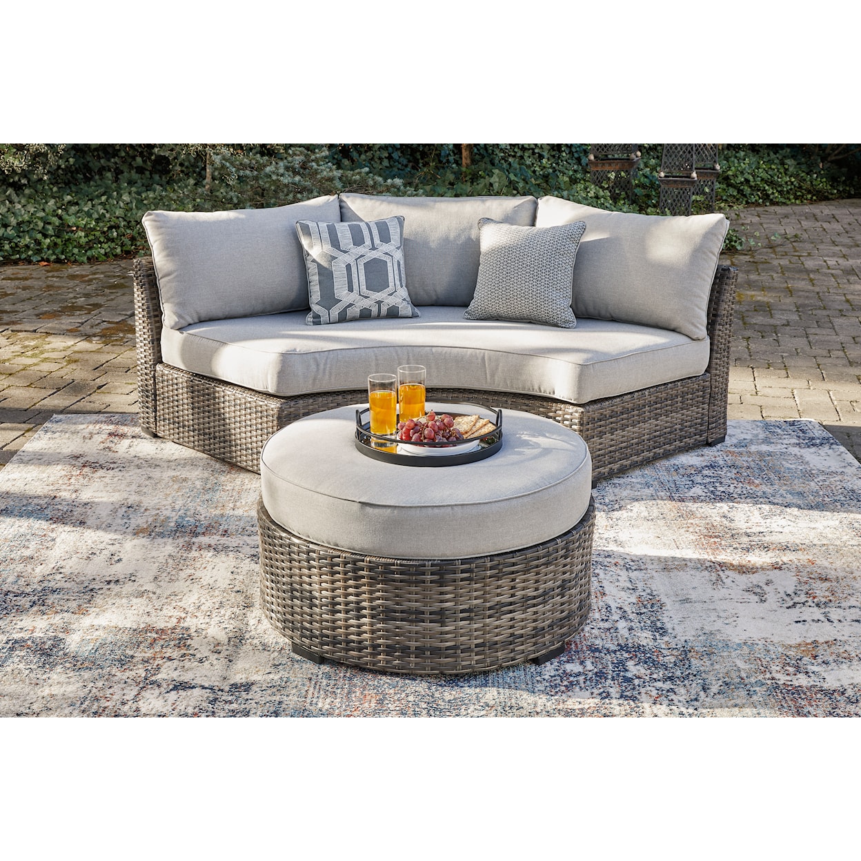 Signature Design by Ashley Harbor Court Ottoman with Cushion