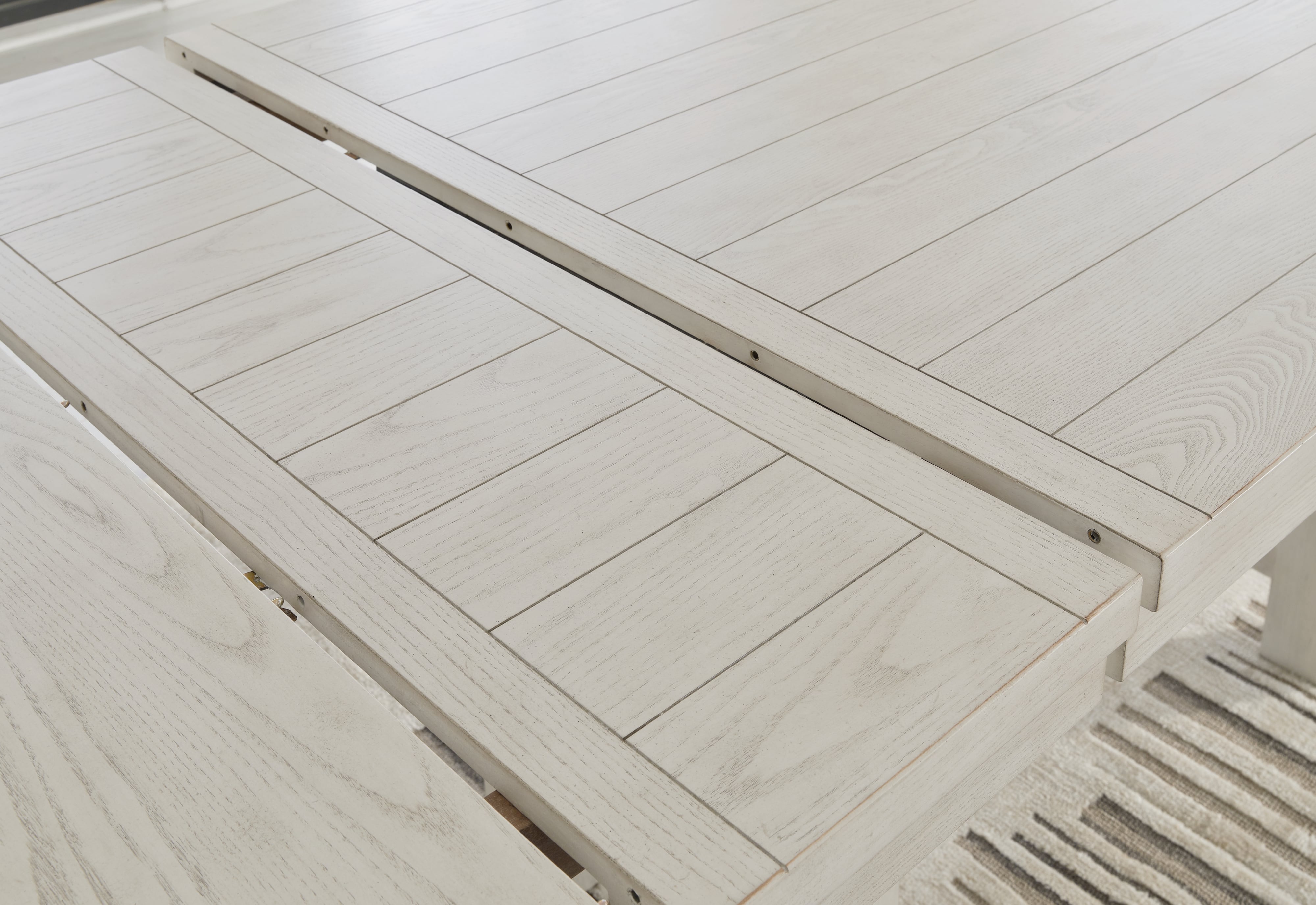 Signature Design by Ashley Robbinsdale Counter Height Dining Table And 4 Barstools