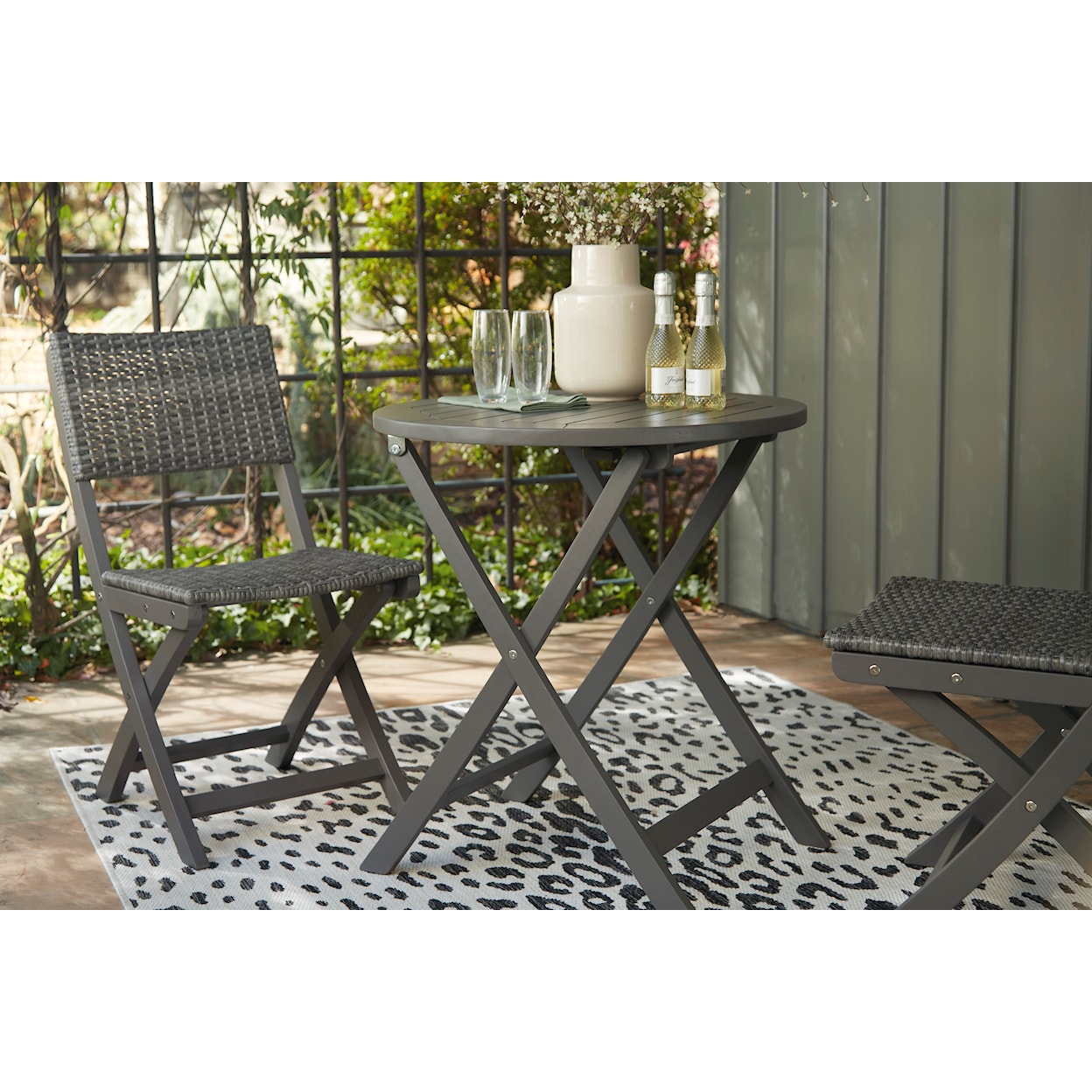 Benchcraft Safari Peak Outdoor Table and Chairs (Set of 3)