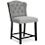 Signature Design by Ashley Furniture Jeanette Counter Height Bar Stool with Tufted Wingback