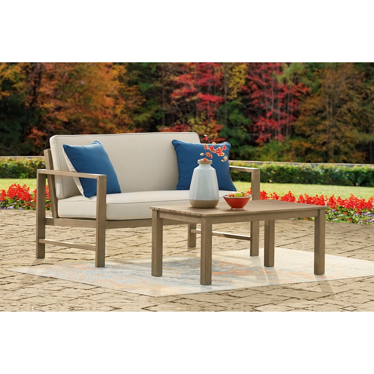 Signature Design Fynnegan Loveseat w/ Table