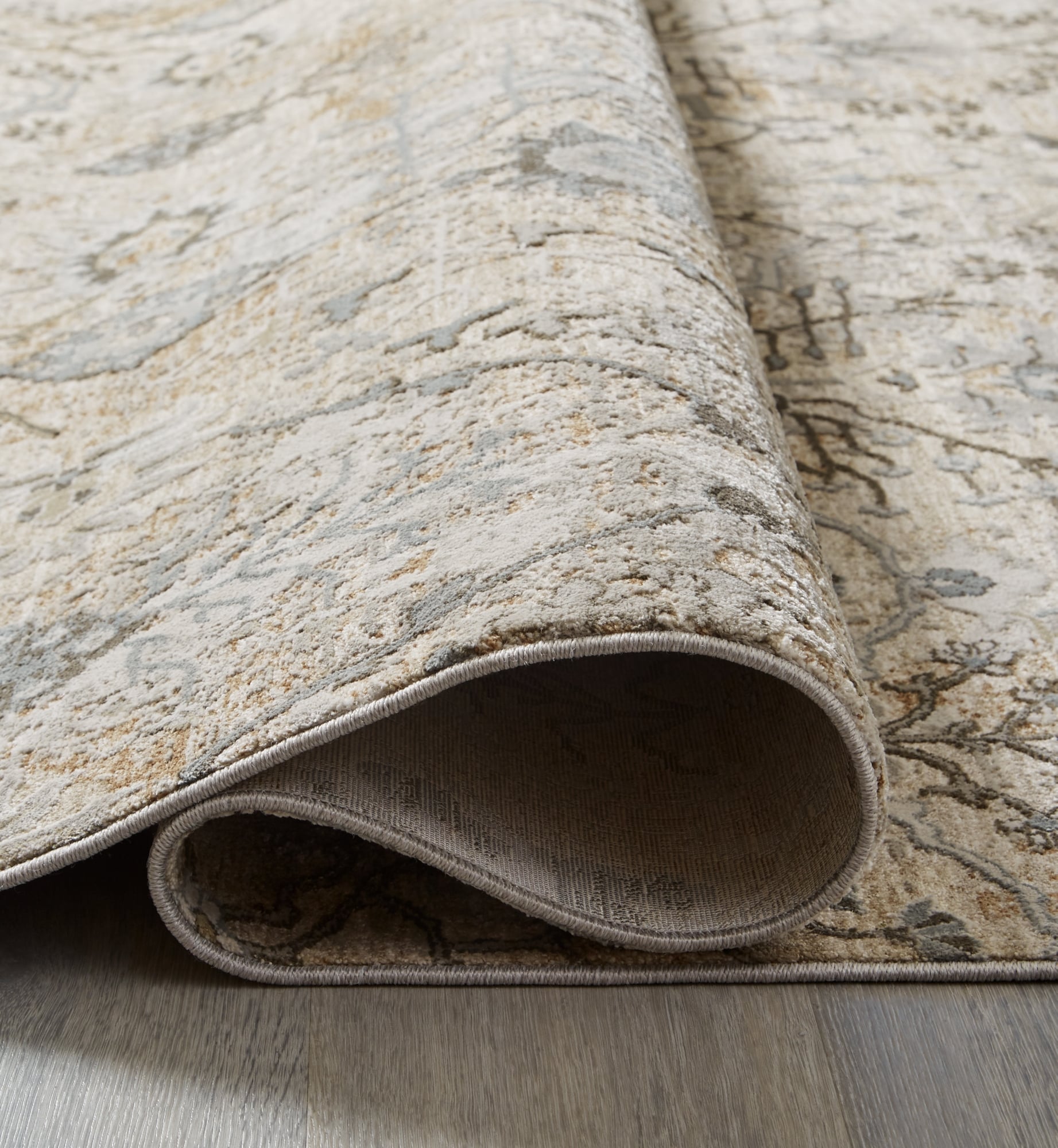 Ashley Signature Design Dudmae R406042 Traditional Woven 5' x 7'5" Rug