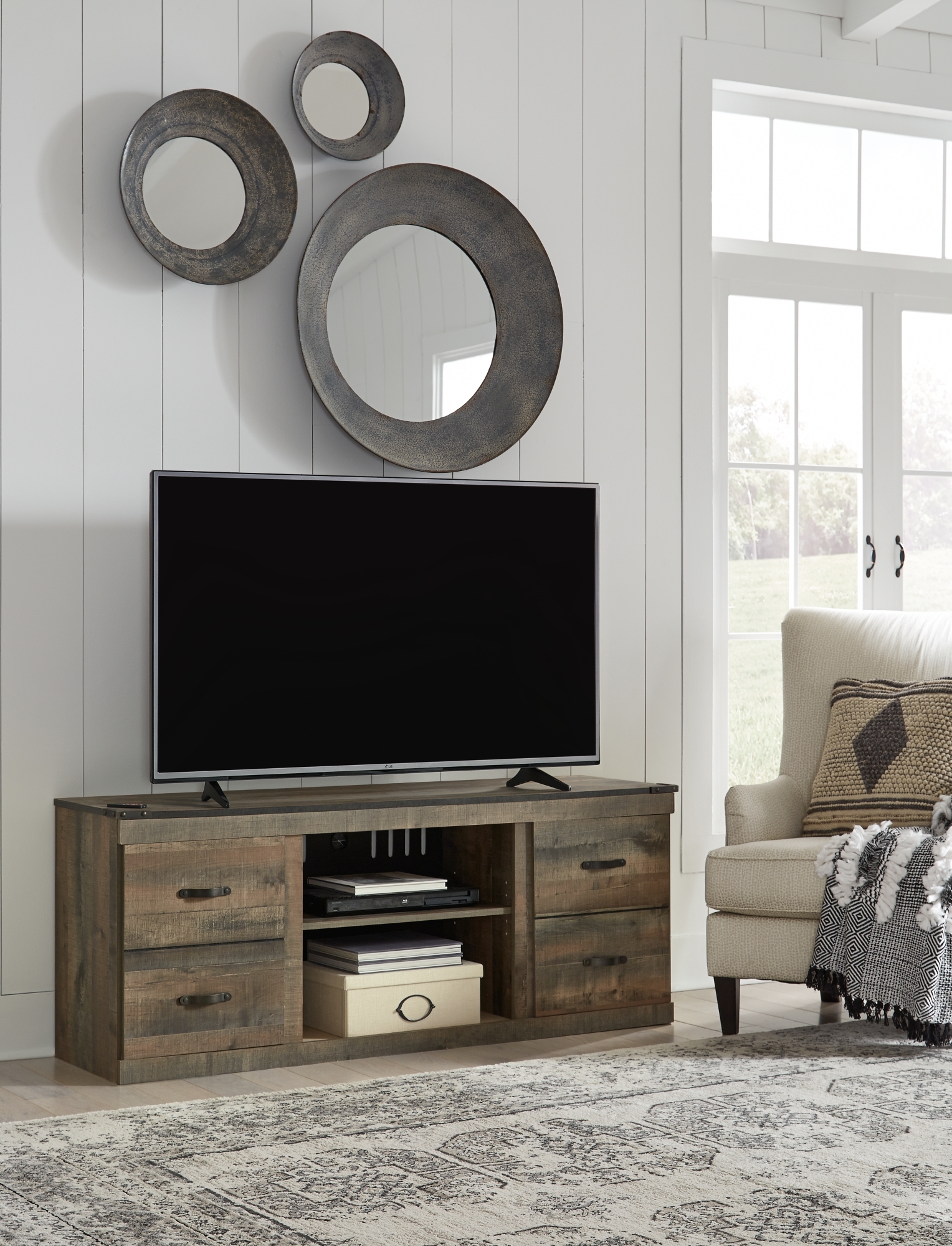 Signature Design by Ashley Trinell Lg TV Stand W/ Fireplace Option