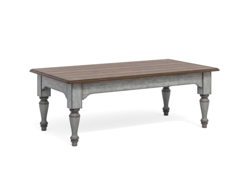 Relaxed Vintage Rectangular Cocktail Table with Turned Legs