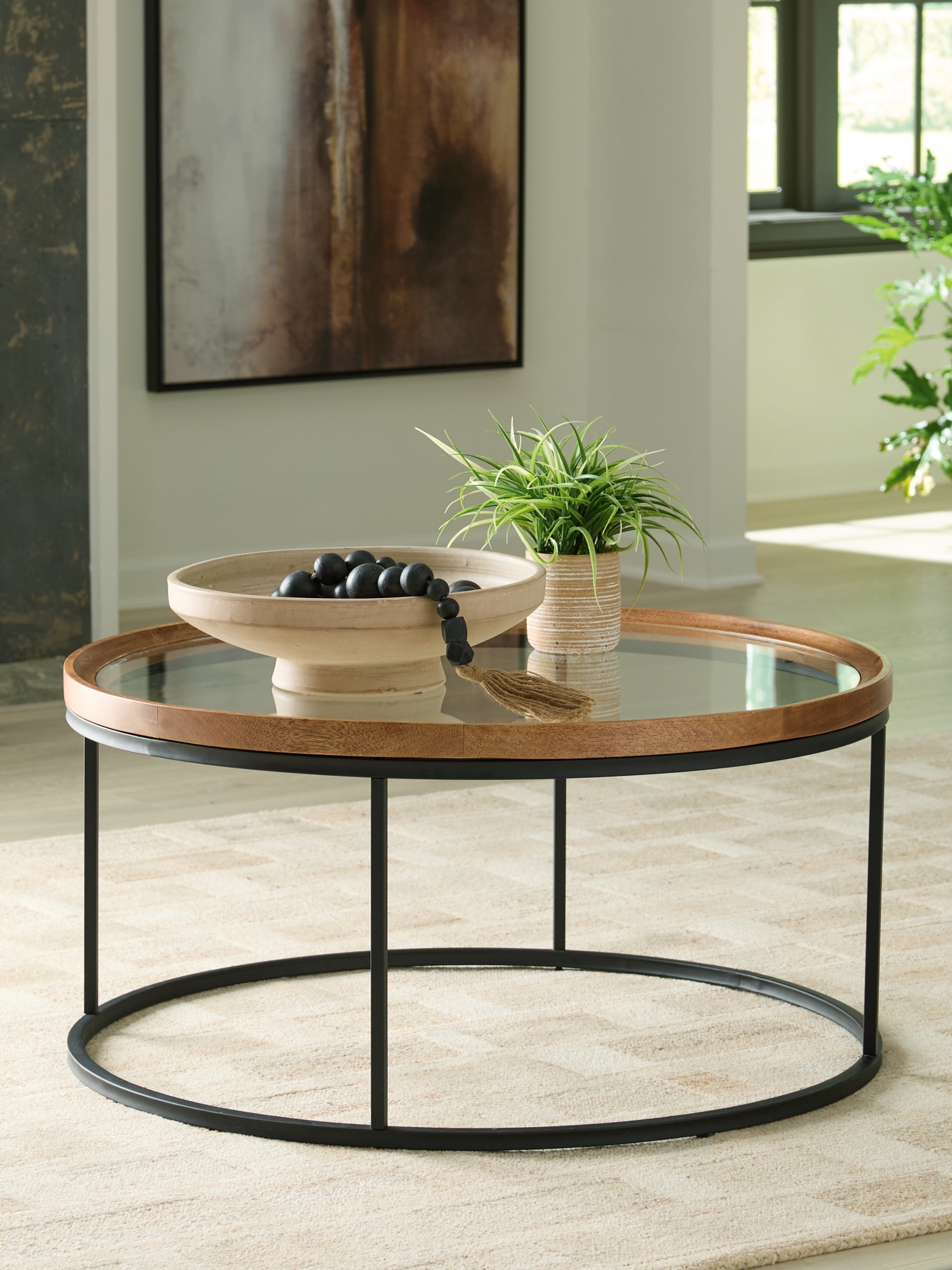 Signature Design by Ashley Noraluna Round Coffee Table