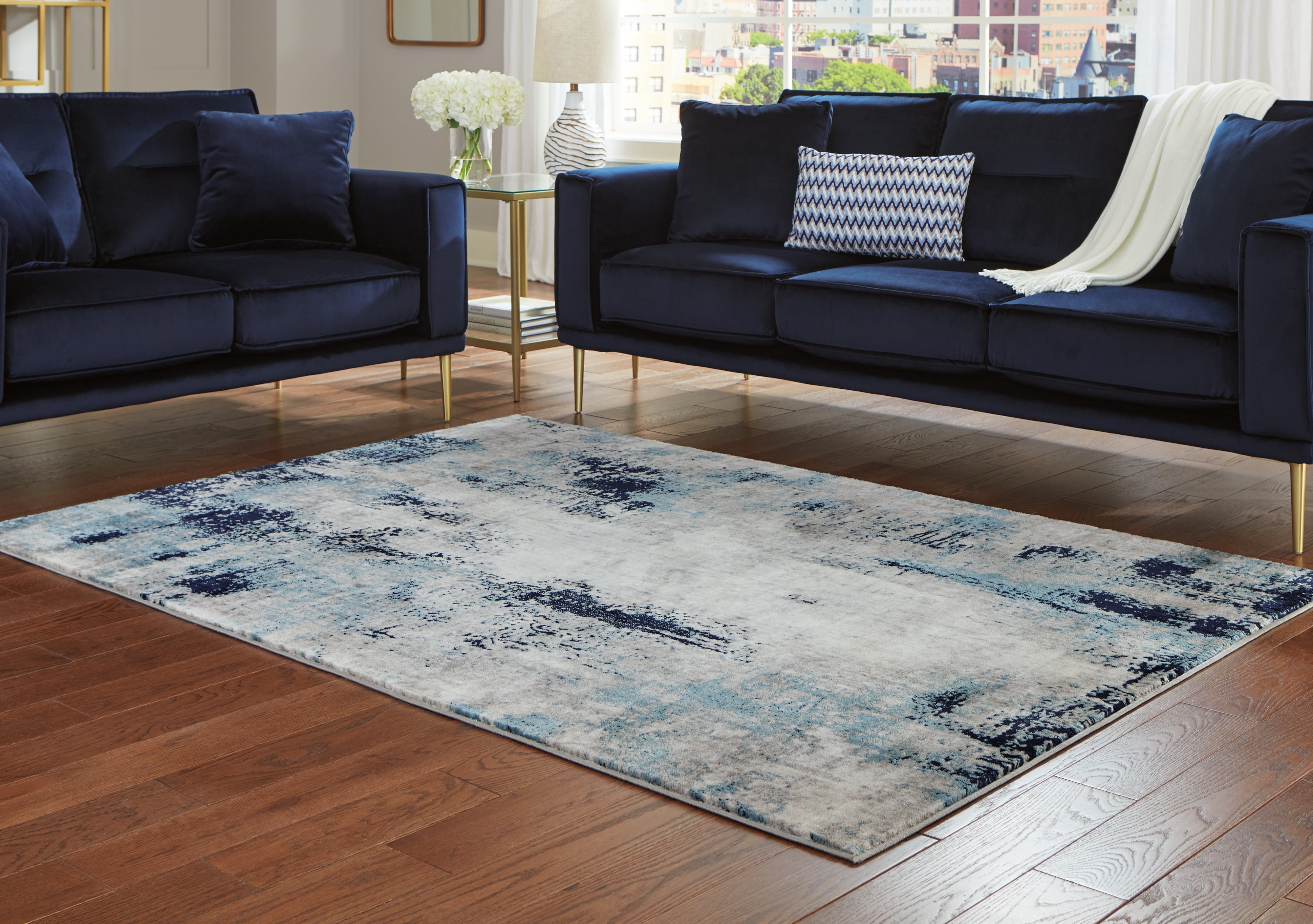 Signature Design by Ashley Leonelle 7'10" X 10' Rug