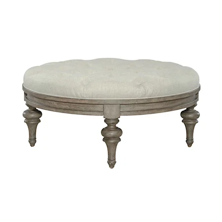Transitional Round Cocktail Ottoman with Tufted Cushion