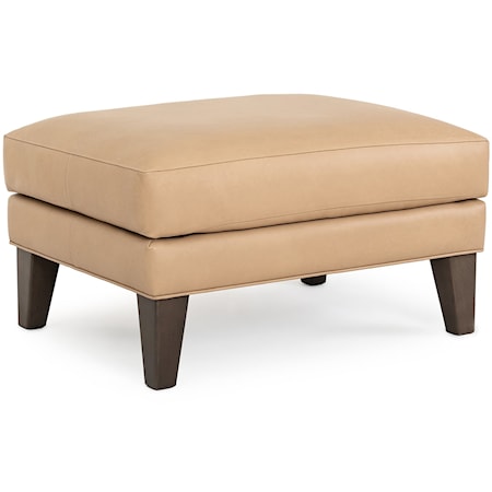 Transitional Upholstered Ottoman with Exposed Wood Legs