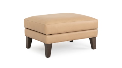 Transitional Upholstered Ottoman with Exposed Wood Legs