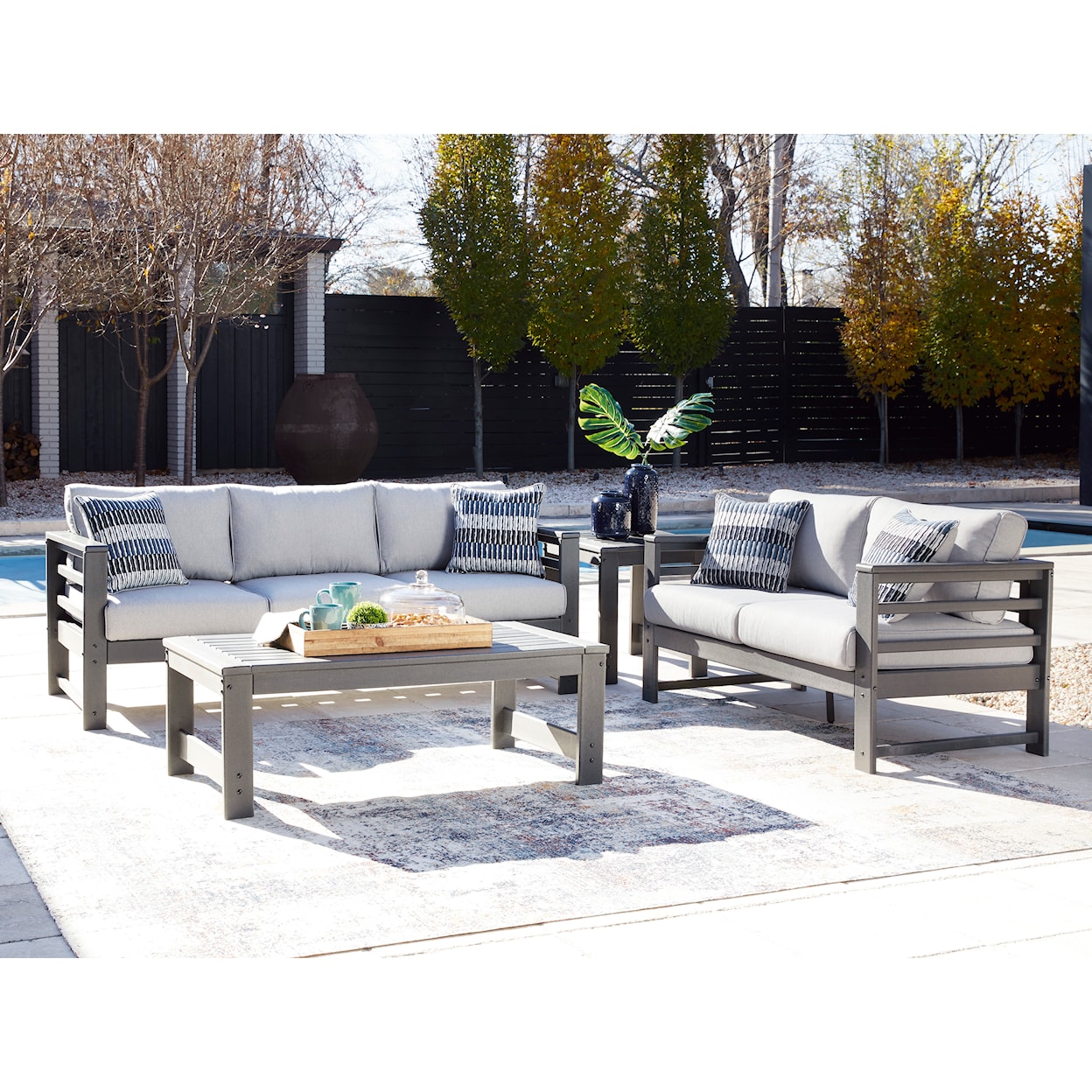 Signature Design by Ashley Amora Outdoor Loveseat with Cushion