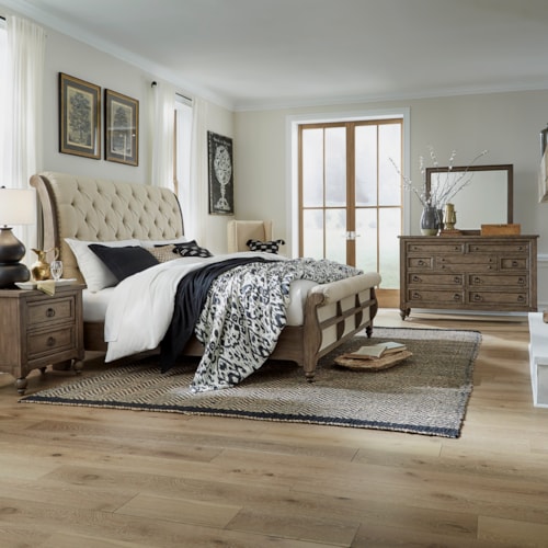 Traditional 4-Piece Upholstered California King Sleigh Bedroom Set