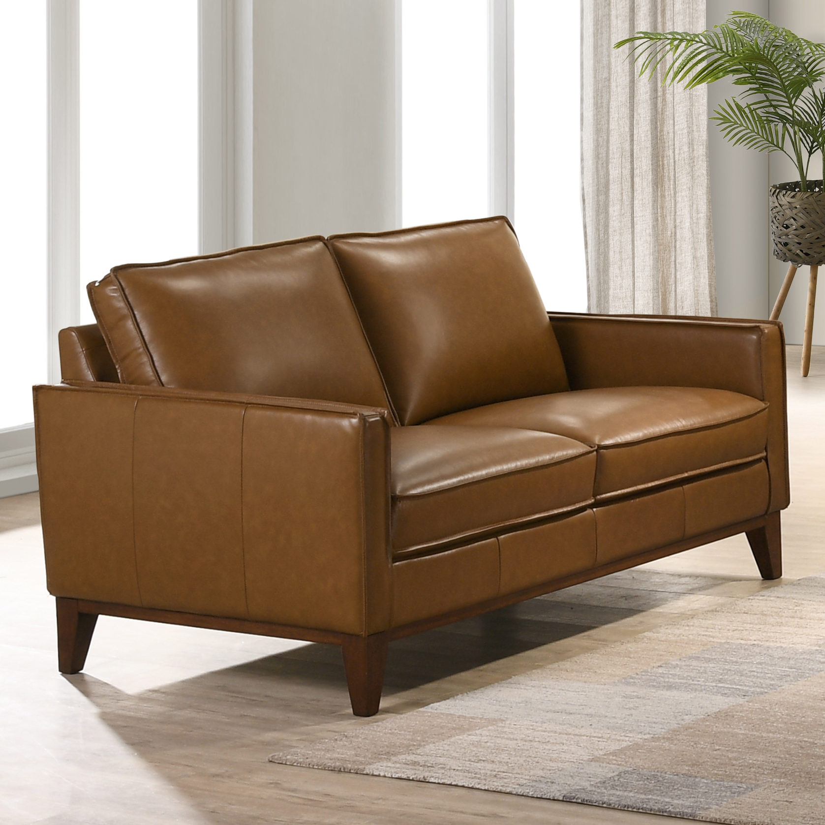 Contemporary on sale leather loveseat