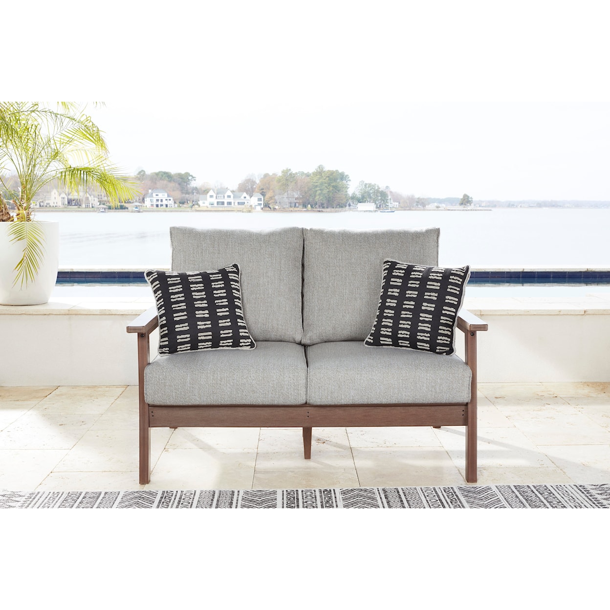 Ashley Furniture Signature Design Emmeline Outdoor Loveseat with Cushion