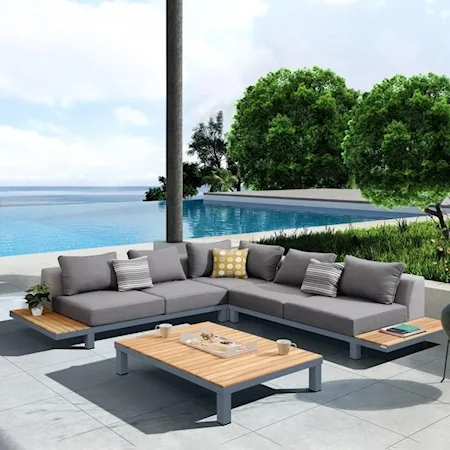 Contemporary 4-Piece Outdoor Sectional Set with Dark Gray Cushions and Modern Accent Pillows