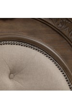 Nailheads and button-tufted headboard